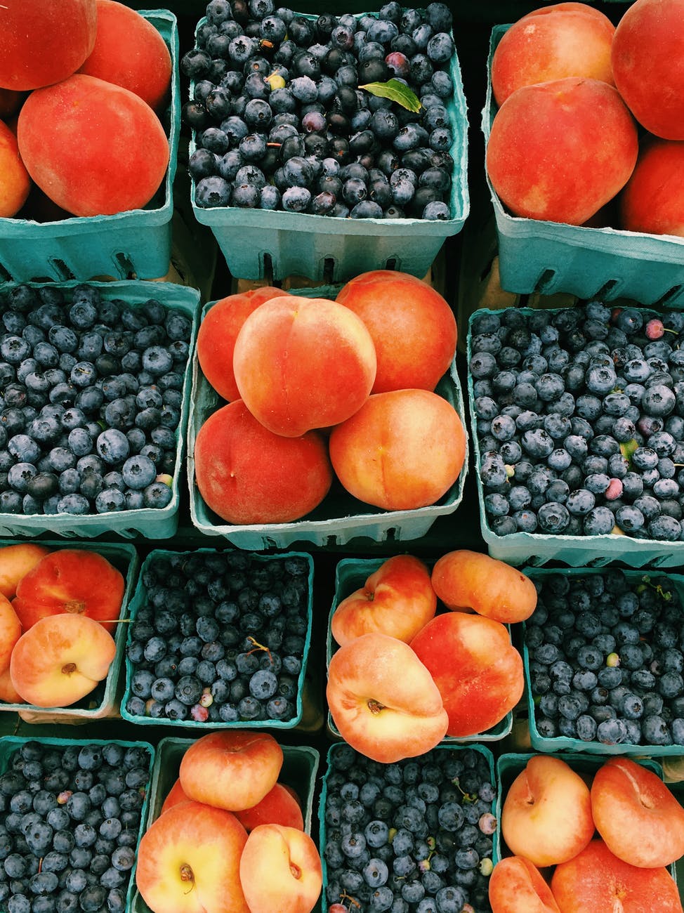 fruits in green baskets