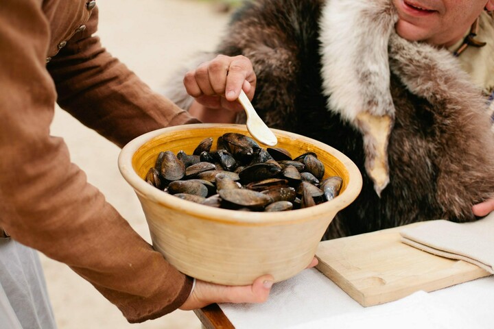 Muscles are served up in a big wooden bowl as part of a classic Thanksgiving meal at Plimoth Patuxet.